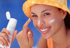 corbis_rm_photo_woman_applying_sunscreen.jpg