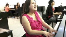 Betina Vega plays on a piano. The 20 year old is the first and only person in San Antonio to teach piano braille music. She is looking for a master of braille music to hone her skills.