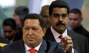 Hugo Chávez, left, and Nicolás Maduro, Chavez's hand-picked successor, in Caracas last year. Photograph: AP