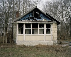 A decaying house in Detroit's Brightmoor neighborhood, where there are many vacancies that end up burnt-down or bulldozed.