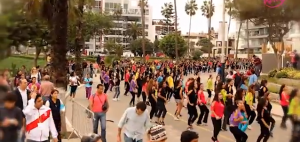 Participants dance their way to the finish line of world's first choreographed race in Lima, Peru. 