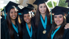 Giovanna Robledo (second from the right) and her friends on graduation day at Olympian High School, in Chula Vista.