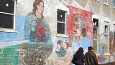 A historic mural depicting religious themes along 18th Street in Pilsen