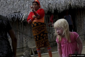 Iveily Morales, 3, who is part of the albino or "Children of the Moon" group in the Guna Yala indigenous community, stands next to her mother at their house on Ustupu Island in the Guna Yala region, Panama April 24, 2015. REUTERS/Carlos Jasso