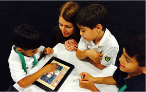 Bilingual Children's Enterprise founder Deborah Castillero tests her new app with homeschooled children at a May conference in Miami. (Photo courtesy Deborah Castillero)
